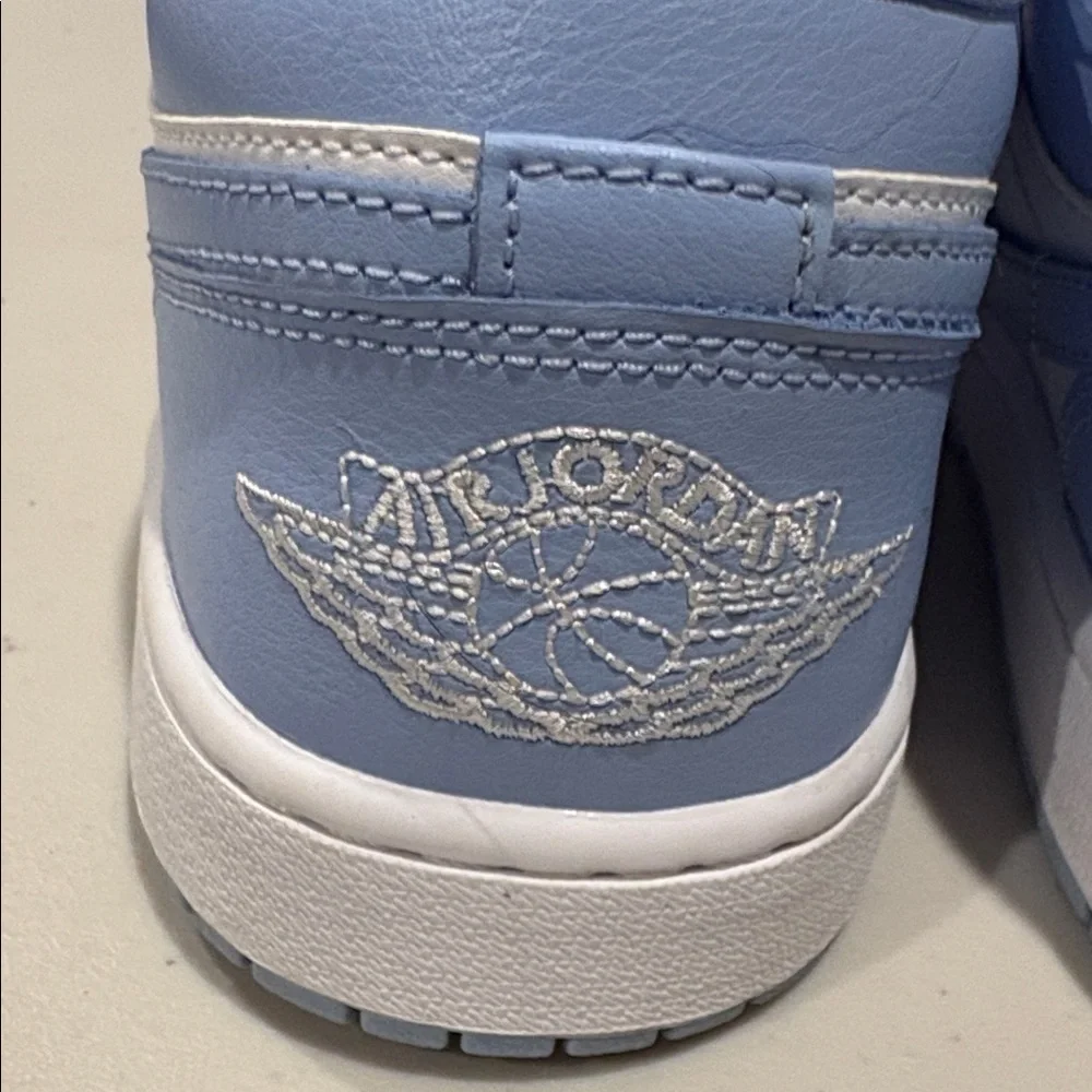 Nike - Women's Air Jordan Retro 1 Low Sneakers. White and baby blue.